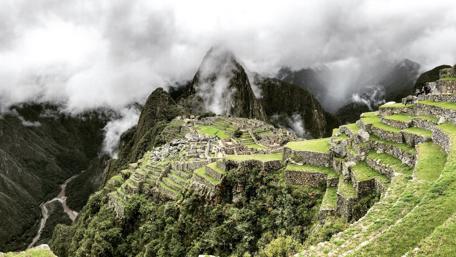 Misty Majesty of Machu Picchu's Ancient Peaks wallpaper