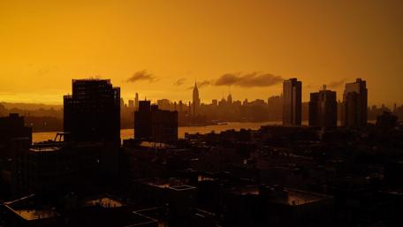 Vibrant Sunset Over Urban Skyline wallpaper