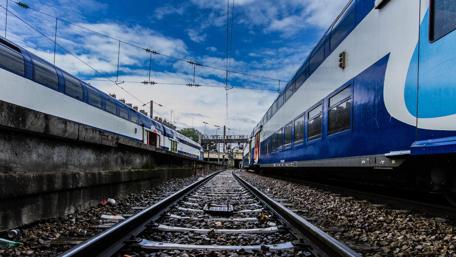 Tracks Through Trains and Sky Above wallpaper