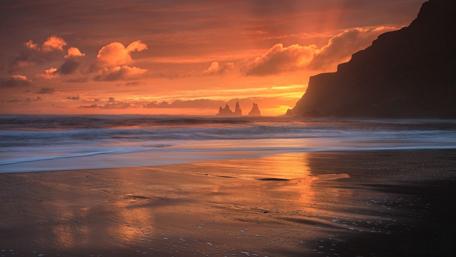 Sunset Serenity on a Sandy Shore wallpaper