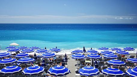 Tranquil Mediterranean Beach in Summer Vibes wallpaper