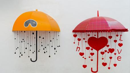 Whimsical Romance Under Colorful Umbrellas wallpaper