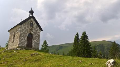 Tranquil Church Amidst Italian Hills wallpaper