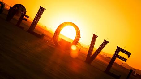Title: Embracing Love at Sunset Horizon wallpaper