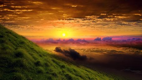 Golden Sunrise Over a Serene Hillside wallpaper