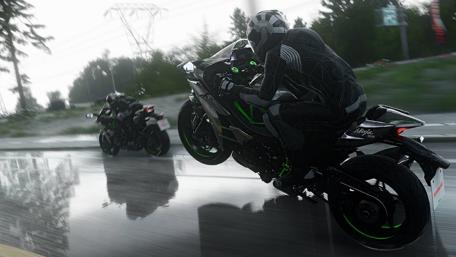 Thrilling Rainy Ride on Motorbikes wallpaper