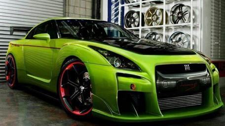 Sleek Green Racing Beauty wallpaper