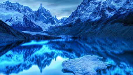 Majestic Glacier Reflections in a Tranquil Landscape wallpaper