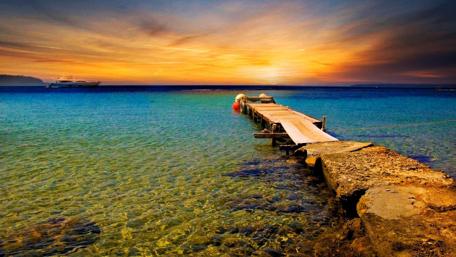 Sunset Bliss Over Serene Pier wallpaper