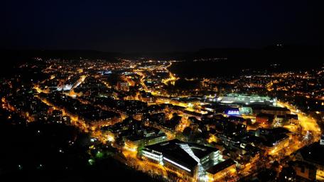 Stunning Night Cityscape Illuminated by Vibrant Lights wallpaper