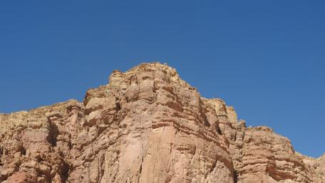 Majestic Rock Formations Under Clear Blue Skies wallpaper