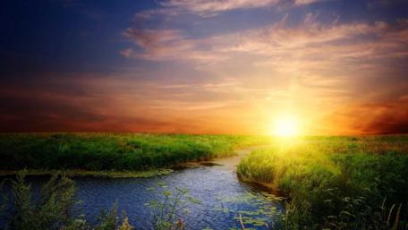 Serene Sunrise Over a Tranquil Canal wallpaper