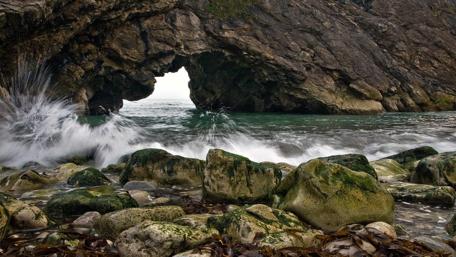 Natural Archway Among Coastal Stones wallpaper