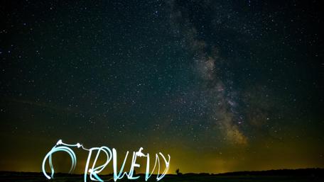 Starry Night Sky with Vibrant Colors wallpaper