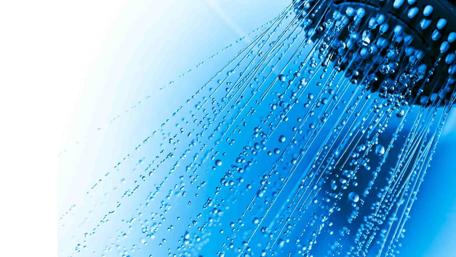Refreshing Water Drops in a Shower Setting wallpaper