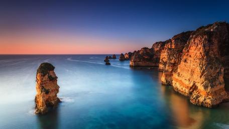 Ponta da Piedade's Majestic Evening Glow wallpaper
