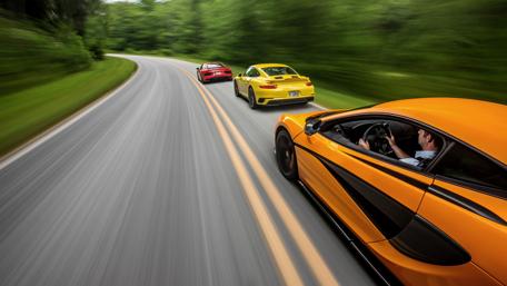 Ultimate Dream Cars on a Scenic Road Trip wallpaper