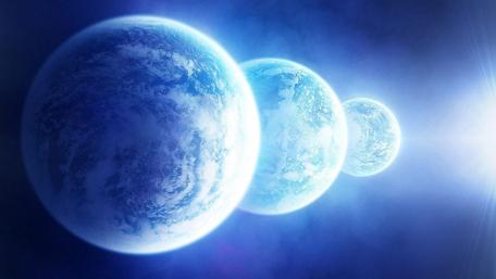 Tranquil Celestial Scene of Three Planets wallpaper