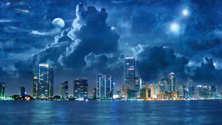 Futuristic City Under a Dreamy Night Sky wallpaper