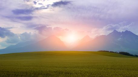 Serene Sunrise Over Majestic Mountains wallpaper