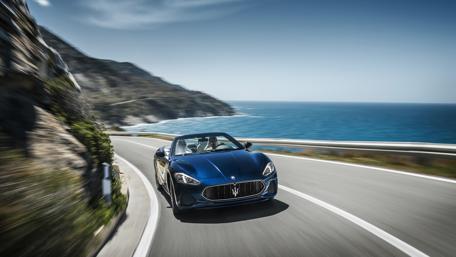 Sleek Maserati GranCabrio on a Coastal Drive wallpaper