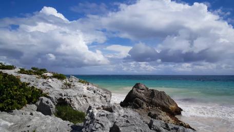 Turquoise Waves and Rocky Shores of Tulum wallpaper