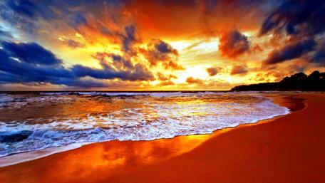 Tropical Sunset Over Golden Beach Waves wallpaper