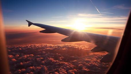 Aerial View of Sunset Beyond the Clouds wallpaper