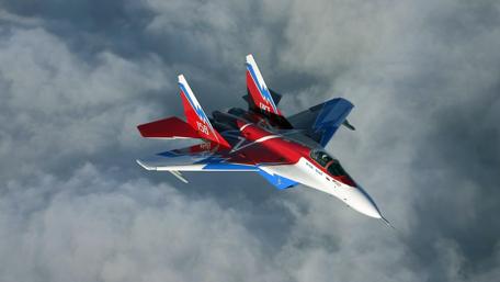 Soaring MiG-29 in Cloudy Skies wallpaper