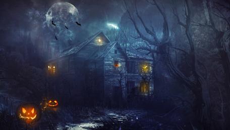 Haunted House under a Halloween Moon wallpaper