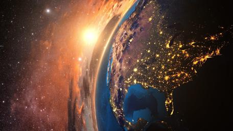 Sunrise Over Earth's City Lights wallpaper