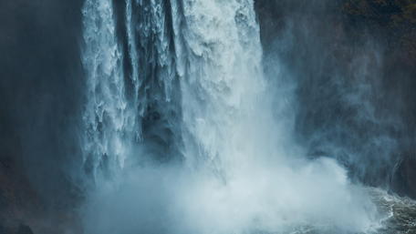 Majestic Waterfall in Serene Nature Scene wallpaper
