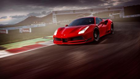 Red Ferrari Racing on Scenic Track wallpaper