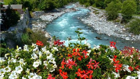 Flowery River in Countryside Village wallpaper