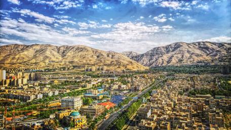 Cityscape with mountains wallpaper
