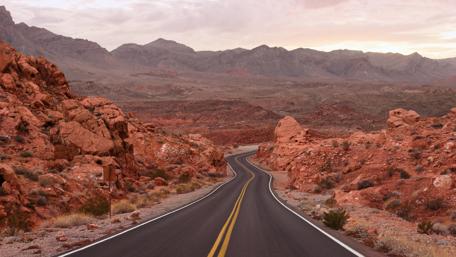 Endless road in stone desert wallpaper