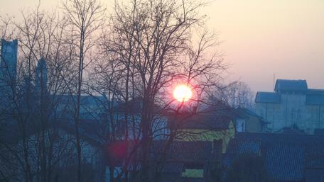 Serene Sunset Over Urban Landscape wallpaper