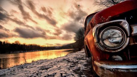 Vintage car at riverside wallpaper