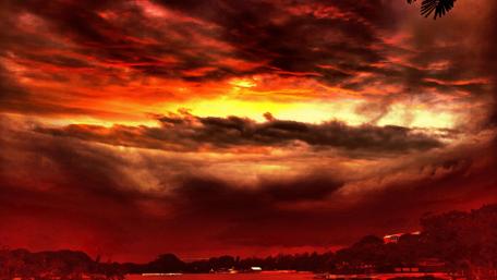 Ethereal Red Sky Over Serene Waters wallpaper