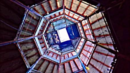 Industrial Spiral Perspective Inside a Towering Structure wallpaper