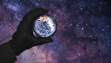 Cosmic Journey Through a Handheld Universe wallpaper