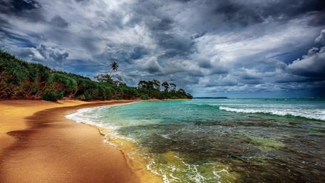 Tropical cloudy beach wallpaper