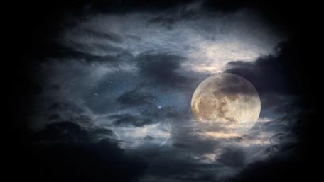 Full moon in the night sky wallpaper