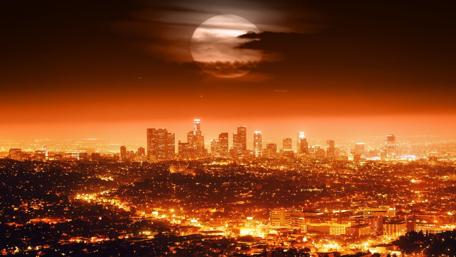 Full moon in the dark sky above Los Angeles wallpaper