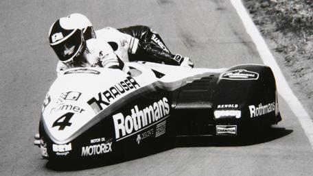 Speed and Precision in Sidecar Racing Artistry wallpaper