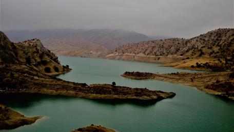 Tranquil Waters Amidst Mountainous Terrain wallpaper