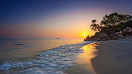 Sunset over the beach wallpaper