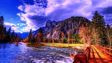 Wooden bridge over the river wallpaper