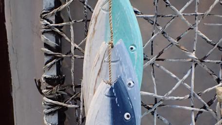 Fishing Memories Captured in Wood Art wallpaper