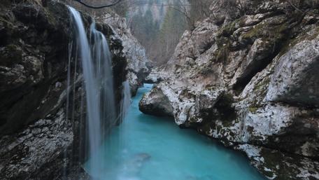 Close up of water falling over a rock face - Timelapse photography wallpaper